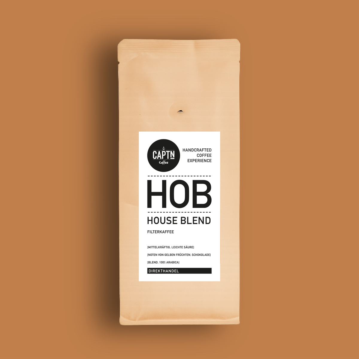 House Blend Kaffe auf Bernstein-farbenm Hintergrund