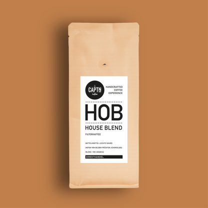 House Blend Kaffe auf Bernstein-farbenm Hintergrund
